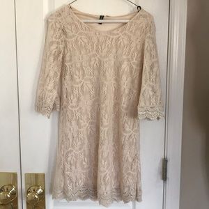 Divided cream lace dress size four